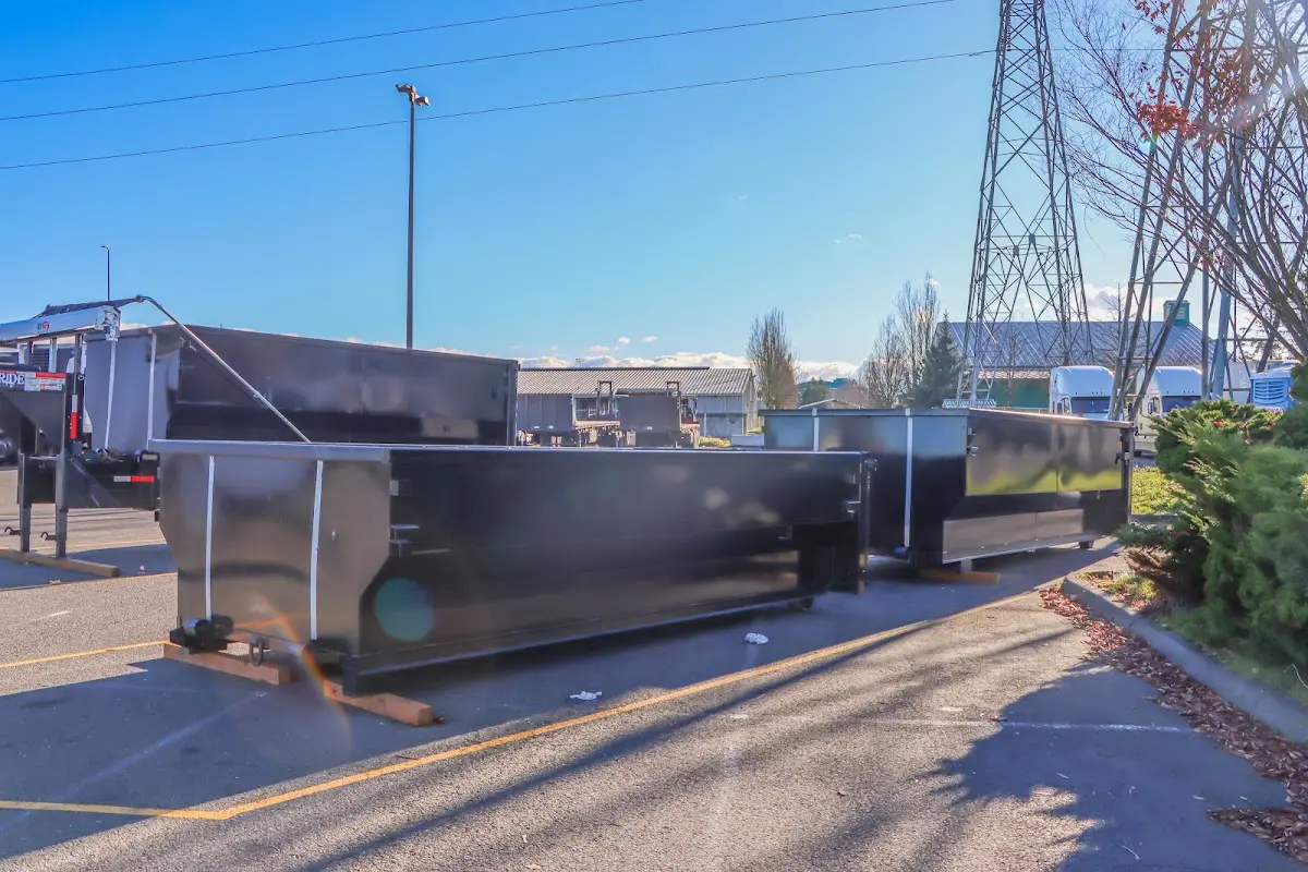 Roll-off dumpster ready for waste disposal at job site for 12 Yard Dumpster Rental in Cedar Grove